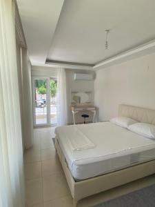 Postel nebo postele na pokoji v ubytování Konyaaltı tatil evleri & konaklama Türkiye - Antalya + 37 fotografií