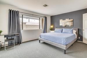 a bedroom with a bed and a window at 5 Mi to Las Vegas Strip Condo with Community Perks! in Las Vegas +18 photos