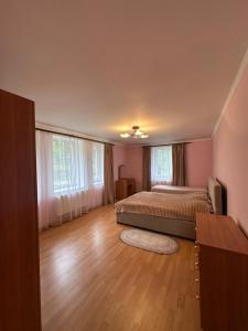 Postel nebo postele na pokoji v ubytování Садиба "Джерело"