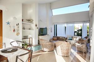 Televisyen dan/atau pusat hiburan di Villa Dapper Apartment 3