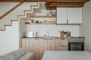 Kuchyň nebo kuchyňský kout v ubytování Abrigos do Castelo