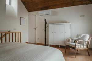 Postel nebo postele na pokoji v ubytování Abrigos do Castelo