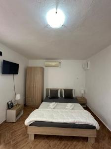 Krevet ili kreveti u jedinici u okviru objekta Apartman Nina