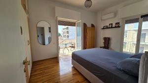 Ένα ή περισσότερα κρεβάτια σε δωμάτιο στο Pilion Horizon Apartment