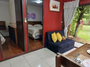 Cama ou camas em um quarto em Espaço Holístico Chalés