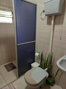Um banheiro em Espaço Holístico Chalés