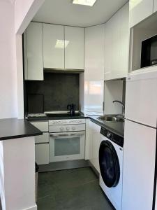 Køkken eller tekøkken på Apartamento turístico Vallecas