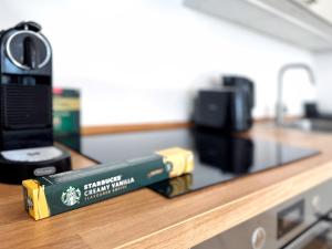 a toy train sitting on top of a counter at HolidayHome Apartments I Airport Deluxe Condo with Terrace in Schönefeld