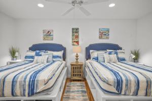 Ένα ή περισσότερα κρεβάτια σε δωμάτιο στο Villa Palma Azul luxury living +55 φωτογραφίες