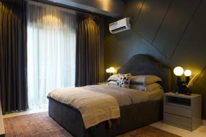 Afbeelding uit fotogalerij van Dark Apartment in Lekki in Lagos