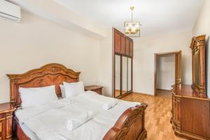 Ένα ή περισσότερα κρεβάτια σε δωμάτιο στο Large 2 bedroom near Republic Square Mayrig Building