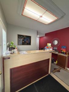 Telewizja i/lub zestaw kina domowego w obiekcie Lakeshore Suites