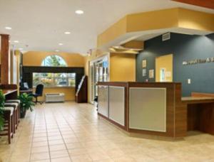 a lobby of a hospital with a reception desk at Microtel Inn & Suites in Dickson City