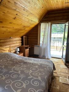 Postel nebo postele na pokoji v ubytování Садиба "Джерело"