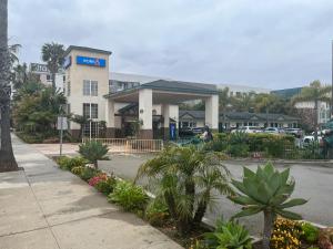 a building with a sign on the side of a street at Oceanside, CA – Marina / Camp Pendleton in Oceanside
