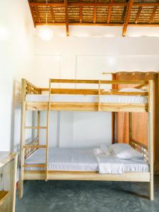 Postel nebo postele na pokoji v ubytování Villa De Mikaël