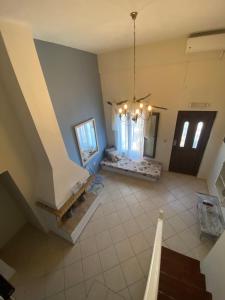 an overhead view of a living room with a staircase at Assos Caldera in Kefalonia