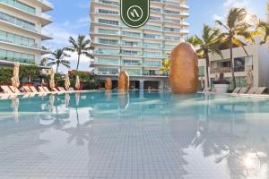 Galería fotográfica de Beachfront 1 BR Condo with Multiple Pools - Gym en Puerto Vallarta