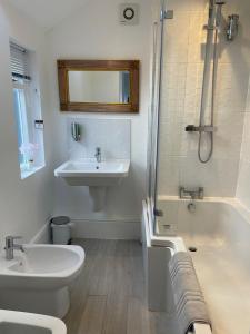 Koupelna v ubytování Heathcote Llandudno