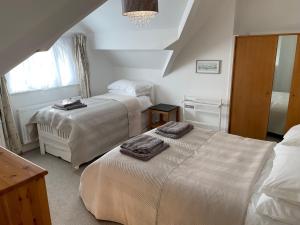 Postel nebo postele na pokoji v ubytování Heathcote Llandudno