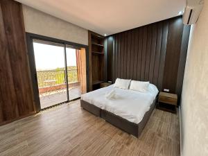 Postel nebo postele na pokoji v ubytování Villa de Luxe Tabaktoukt Agadir 6 SUITES FAMILLE UNIQUEMENT
