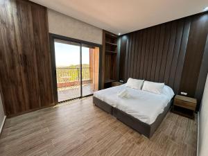 Postel nebo postele na pokoji v ubytování Villa de Luxe Tabaktoukt Agadir 6 SUITES FAMILLE UNIQUEMENT