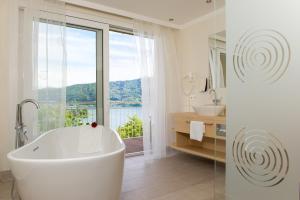 Koupelna v ubytování das Balance - Spa & Golf Hotel am Wörthersee