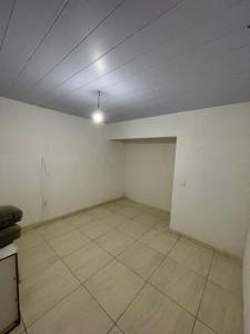 an empty room with white walls and a ceiling at Apartamento Avenida Caruaru in Garanhuns