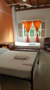 Hotel San Judasにあるベッド