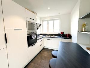 Kuchyň nebo kuchyňský kout v ubytování COLIVING - WIFI - TV - Proche TRAM - L'ESCALE PARTAGEE