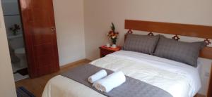Cama o camas de una habitación en Qente Wings