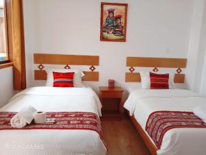 Cama o camas de una habitación en Qente Wings