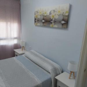 Posteľ alebo postele v izbe v ubytovaní Urbanización las Sirenas, 2 dormitorios + 7 fotografií