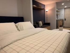 Katil atau katil-katil dalam bilik di Cómodo loft con lavadora wifi y parking