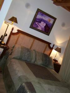 Ένα ή περισσότερα κρεβάτια σε δωμάτιο στο A Casa de Mañas