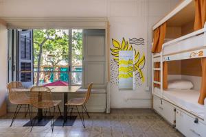 Cama ou camas em um quarto em The Loft House Barcelona