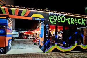 a food truck with a sign on the side of it at Acogedor y central Apartamento ! in Pasto