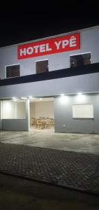 a hotelype sign on the side of a building at Hotel Ype in Floriano