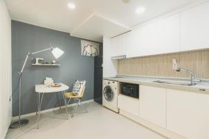 Η κουζίνα ή μικρή κουζίνα στο Venture Town Gukbin Seowon