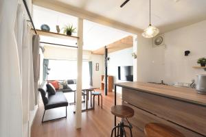Posezení v ubytování INUYAMA BASE Vacation rental