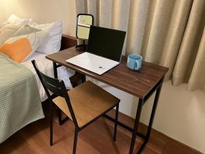 Postel nebo postele na pokoji v ubytování INUYAMA BASE Vacation rental