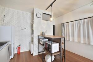 Kuchyň nebo kuchyňský kout v ubytování INUYAMA BASE Vacation rental