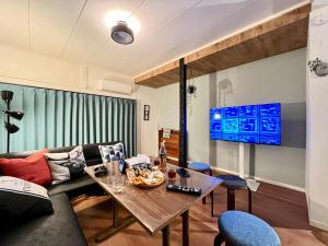 Posezení v ubytování INUYAMA BASE Vacation rental