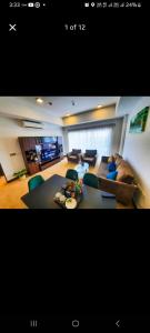 Χώρος καθιστικού στο Ocean breeze residencies one bedroom apartment by NB