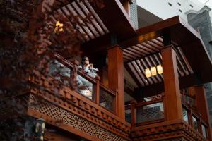 A balcony or terrace at Wyndham Grand Plaza Royale Jiuzhaigou