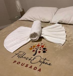 Posteľ alebo postele v izbe v ubytovaní Pousada Folhas de Outono