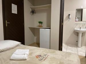 Posteľ alebo postele v izbe v ubytovaní Pousada Folhas de Outono + 42 fotografií