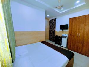 Hotel Yolo- Chandigarh客房内的一张或多张床位
