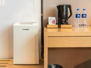 Kuchyň nebo kuchyňský kout v ubytování Lavande Hotel Xi'an 1st Fengcheng Road Municipal Library Metro Station