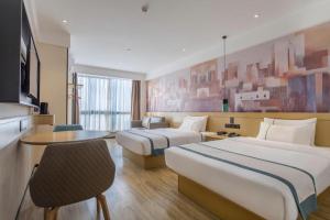 Ένα ή περισσότερα κρεβάτια σε δωμάτιο στο City Comfort Inn Shenzhen Exhibition Center North Huaqiang Metro Station +274 φωτογραφίες